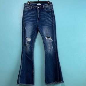 Classic Indigo Flare Jeans with Distressed Details